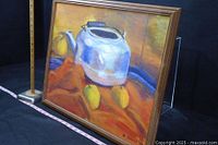 Full front view of the oil painting showing the kettle and apples with measuring sticks to indicate size.