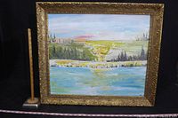 Full view of the framed landscape painting showing colors, composition, and size relative to ruler and meter stick.