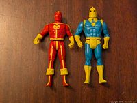 Front view of Red Tornado and Doctor Fate action figures showing costumes and logo details