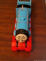Front view of the blue Gordon engine showing the character's face and red base.