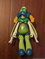 Front view of Curio Power Rangers Dino Charge action figure with visible colors and details of the head, torso, arms, and legs.