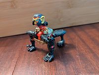 Transformers Beast Wars Optimus Minor figure in gorilla mode from side angle showing detailed paint and articulation on legs and arms.