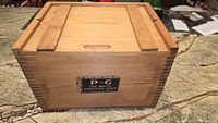 Closed vintage wooden soap box with visible dovetail joints and a black label with beige print that reads "P&G The White Naphtha Soap Procter & Gamble Cincinnati."