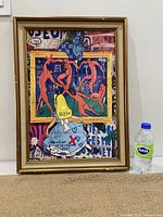 Front view of the framed pop art print featuring Alice in Wonderland admiring Picasso-style red figures with crowns.