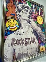 Front view showing the pop art print of the Statue of David with graffiti elements in a vintage frame.
