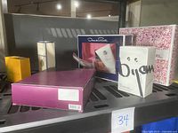 Overview of four fragrance and lotion gift sets arranged on shelf