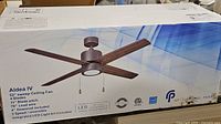 Front of product box showing brand, model name, 52" sweep, 4-blade design and LED feature graphics