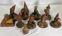 Overview photo showing all 10 collectible Tom Clark gnome figures arranged on white background.