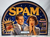 Full view of the SPAM slot machine glass header showing the entire design and branding.