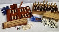 Overview of all games including cribbage board, backgammon set, chess set, dominoes, and checkers.