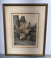 Full front view of framed etching showing frame, glass, matte, and artwork.