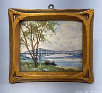 Front view showing full painting and carved frame with hanging loop