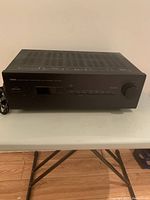 Front view showing full unit with Yamaha branding and power cord.