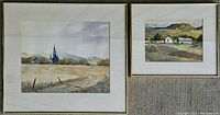 Photo of two framed watercolour landscape paintings by James Halpin lying on carpet, showing overall appearance and frames.