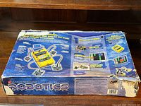 Worn but original LEGO Mindstorms Robotics Invention System box with detailed product images and instructions on the packaging.