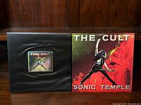 The Cult Sonic Temple 1989 Special Edition vinyl album with black PVC wallet featuring 3-D hologram and album cover sleeve.