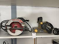 Both tools side by side on a shelf, showing size and color details.