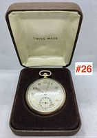 Pocket watch in brown velvet-lined box inscribed ‘Swiss Made’