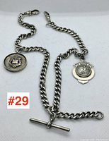 Entire chain laid out with both fobs and T-bar visible