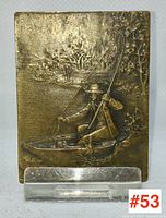 Full view of bronze rectangular fly fishing medal showing the entire relief scene.