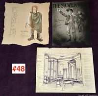 Three unframed sketches displayed together on a dark surface: watercolor character sketch on left, black and white 'The Silver King' poster sketch on top right, detailed ink drawing of a theatrical set interior on bottom right.