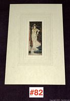 Overall view of unframed artwork with mat showing entire mounted image