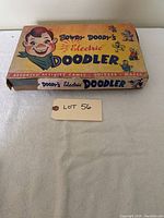 Full view of the Howdy Doody's Electric Doodler box showing front with character art and title