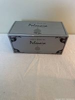 K. Adler Polonaise collection ornament box with branding and collection name visible.