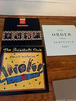Photo showing three 1980s vinyl LP albums with distinct cover art: Level 42, New Order, The Parachute Club.