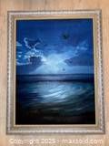 Framed oil painting depicting a night ocean scene with moonlight and clouds.