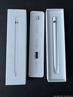 Apple Pencil 1st generation in original box with extra tip shown on instructional card.