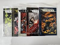 Five Curse of the Spawn comic books issues 25-29 in protective sleeves showing front covers