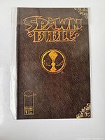 Front cover of Spawn Bible comic book.