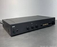 Front three-quarter view of NAD Monitor Series 1000 preamplifier showing chassis and controls