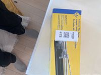 Box showing the brand PCI and product name Ceramic Tile Cutter with details about the cutting length of 12 inches/30.5 cm