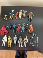 Group shot of all figures and accessories on tabletop