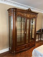 Full front view of china cabinet in room