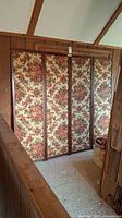 Full view of the 4-panel room divider showing floral fabric and wood frames.