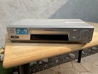 Front view of the silver Sony VHS player showing the Hi-Fi Stereo label and AV input jacks.