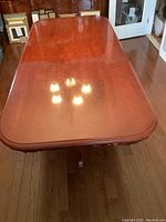 Top view showing polished surface, centre leaf and rounded corners