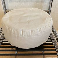 Top view of the meditation cushion showing smooth natural cotton removable cover.