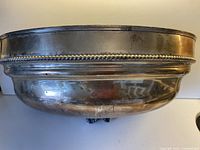 Front view of the metal half circle wall planter showing shape, size, and finish.