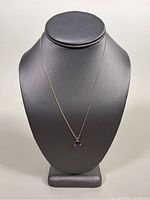 Full view of necklace on display bust