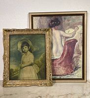 Two framed prints, one of a young girl and one of a nude woman reading, showing the entire lot.