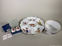 Full lot view showing scalloped sectioned dip platter, soufflé dish, and boxed pair of egg coddlers with Royal Worcester paperwork