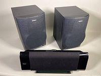 Pair of Sony SS-H991 bookshelf speakers and Klipsch G-17 Air wireless sound system together showing front view.