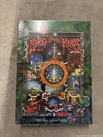 Photo of sealed Lord of the Rings Classic 1000 piece jigsaw puzzle box with detailed classic artwork on the cover.