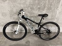 Full side view of bike showing frame, wheels, drivetrain