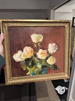 Original oil painting of white and yellow roses in vase against reddish-brown background in gilded frame