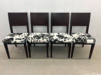 Front view of all four chairs in a row